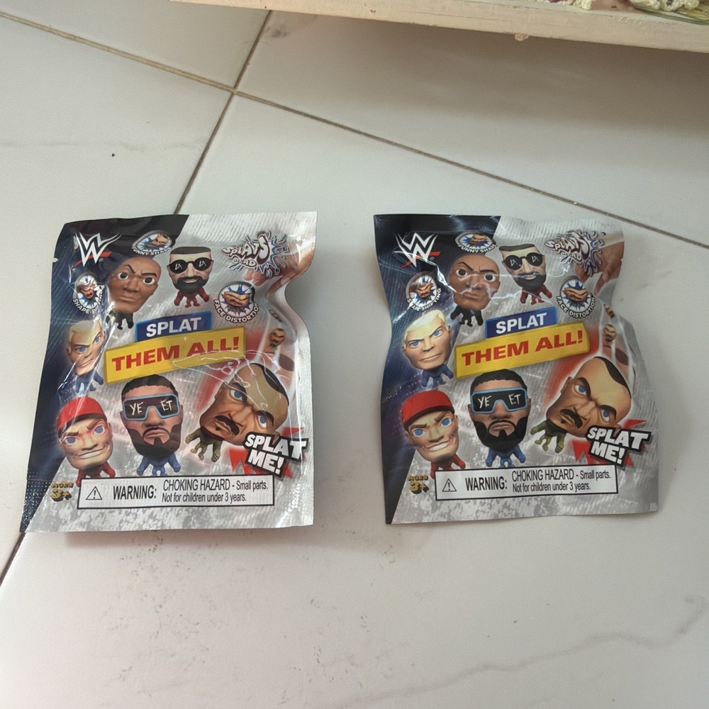 NEW 2 Sealed Packs WWE Splats Heads In The Pack Series Wrestling Stars Splat Me